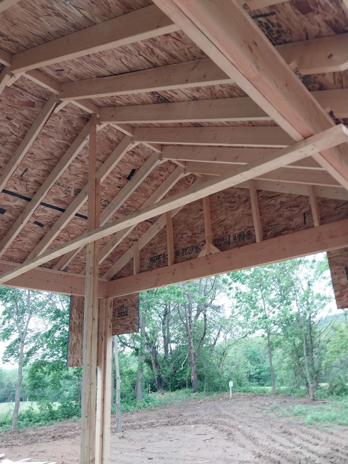 Rafter and ridge framing under a new porch roof